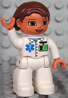 Duplo Figure Lego Ville, Female Medic, White Legs, White Top with ID Badge and EMT Star of Life Pattern, Reddish Brown Hair, Brown Eyes